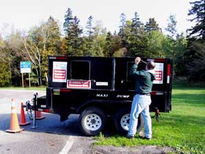 Custom manufactured firewood disposal receptacle at the Mackinac Bridge EAB inspection site.